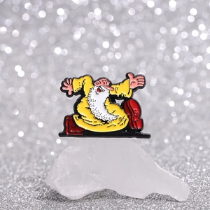 Funny cartoon old man enamel pin in yellow robe displayed on white crystal rock
