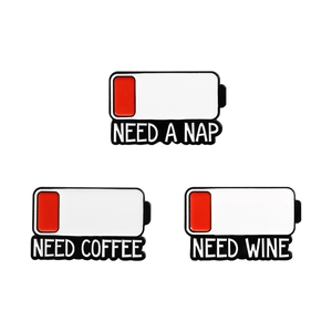 Three battery low enamel pins set with Need a Nap, Coffee and Wine text on white background