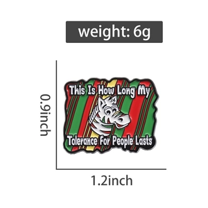 Detail view of colorful zebra enamel pin with humorous English quote on white background