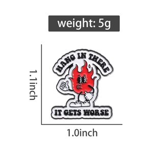 Detail view of red cartoon flame enamel pin with size measurements and weight info