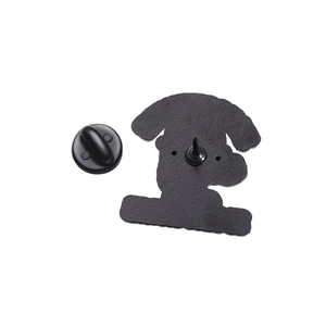 Detail view of the enamel pin back with a black rubber clutch and matte metal finish