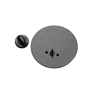 Detail of matte black pin base with rubber clutch back and textured metal finish