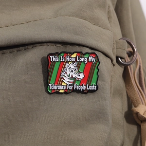 Funny zebra enamel pin with quote on canvas bag, colorful striped metal brooch badge