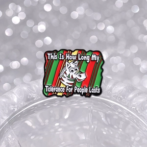 Rectangular zebra enamel pin with red and green stripes and humorous text slogan