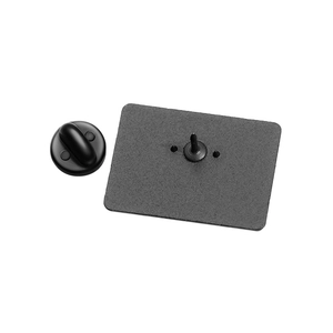 Close-up of geometric square pin back with single pin and black rubber clasp