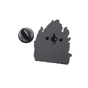 Close-up of black alloy pin back with matte finish and black rubber clutch accessory