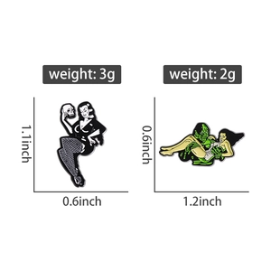 Detail view of vintage horror enamel pins showing exact size and weight measurements