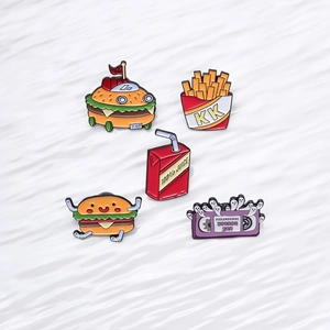 5-piece set of cartoon food enamel pins featuring hamburger, fries, and juice box designs