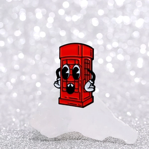 Cartoon red London telephone booth enamel brooch with expressive eyes on white stone
