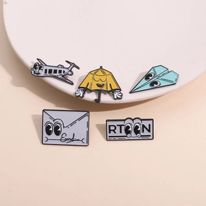 5-piece set of cartoon enamel pins featuring paper planes, umbrellas, and envelopes