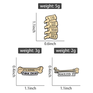 Detailed view of creative orthopedic enamel pins with humorous medical puns and bone shapes