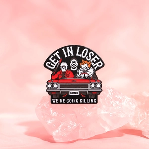 Cartoon horror movie characters in red car enamel pin featuring Get In Loser slogan