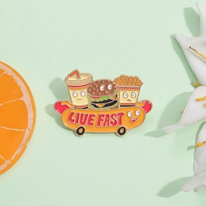 Cartoon fast food brooch featuring a hot dog skateboard with burger and soda icons