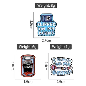 Three-piece set of blue Slipped on My Beans enamel pins with size and weight metrics
