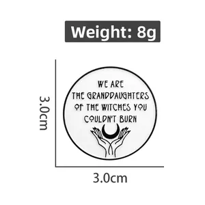 Detail showing white enamel pin dimensions of 3.0cm diameter with Girl Power slogan