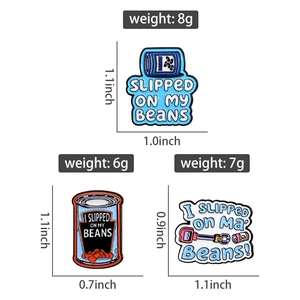 Detailed dimensions and weight of three cute cartoon pill bottle enamel pins in blue and red