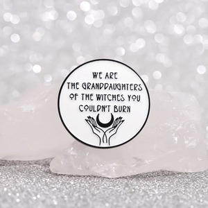 Minimalist white round enamel pin featuring Girl Power witch quote and crescent moon art