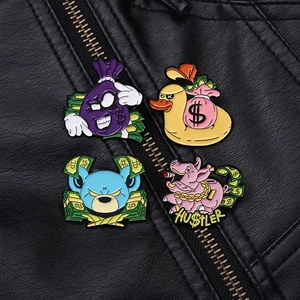 Set of four hip hop style enamel pins featuring cartoon characters on leather background
