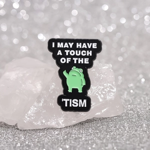 Funny green frog enamel pin badge with I MAY HAVE A TOUCH OF THE TISM text