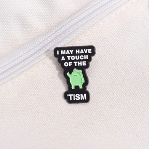 Funny green frog enamel pin on canvas with text I MAY HAVE A TOUCH OF THE TISM