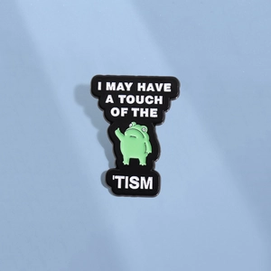 Funny green frog enamel pin badge with text on a light blue background for clothing
