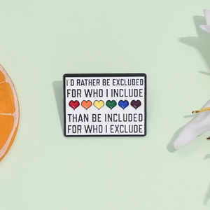Enamel lapel pin with rainbow hearts and inclusive quote on white alloy badge