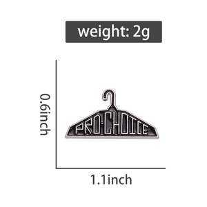 Detailed size view of Pro-Choice hanger enamel pin measuring 1.1 by 0.6 inches