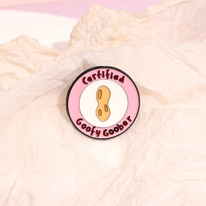 Certified Goofy Goober pink round enamel pin with cute peanut cartoon character