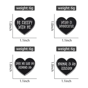 Detail showing 1.1x1.0 inch dimensions and weight of black gothic heart enamel pins
