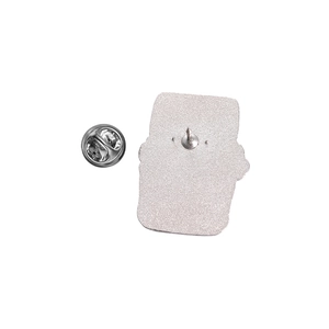 Detail showing the silver metal back of the typewriter enamel pin with butterfly clutch