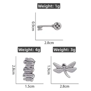 Tableau détaillé de taille et poids pour broches libellule, clé et ruban rétro