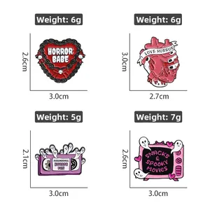 Set of four horror gothic enamel pins featuring spooky motifs and macabre slogans