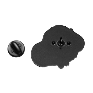 Detailed view of the black metal brooch back with secure rubber clutch pin back