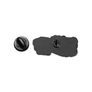 Detail of red cartoon letter enamel pin back with black rubber clutch and matte texture