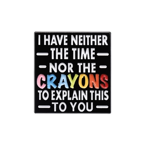 Square enamel pin with sarcastic quote and colorful crayons text on a black background