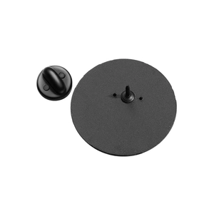 Macro view of a round black metal brooch back base with a matching rubber pin clutch