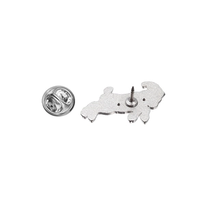 Close-up of vintage animal brooch back with silver matte finish and butterfly pin clasp