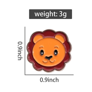 Detail view of cartoon lion enamel pin badge showing 0.9x0.9 inch dimensions and 3g weight