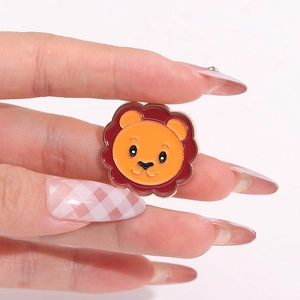 Cute cartoon lion enamel brooch pin made of orange painted alloy for clothing decoration