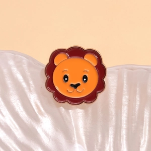 Cute cartoon lion enamel brooch pin with bright orange face and red wavy mane