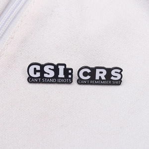 Funny CSI and CRS enamel pins with humorous text on white canvas background for bag decor