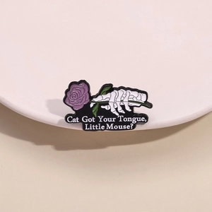 Gothic skull hand holding purple rose enamel pin badge with aesthetic quote lettering