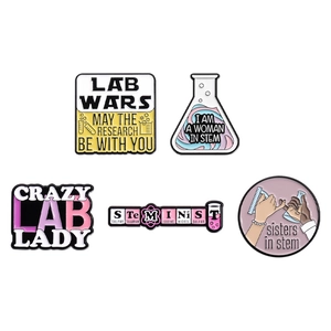Five-piece science enamel pins set featuring STEM themes on a white background