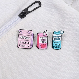 Set of 3 motivational juice and milk box enamel pins in pink, magenta, and sky blue