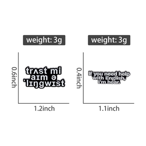 Macro detail of Trust Me I'm a Linguist enamel badges showing exact sizes and weights