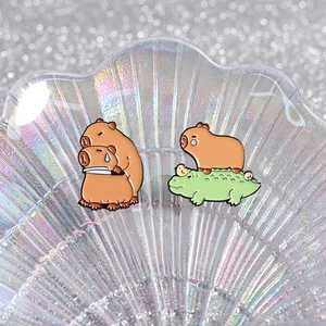 Cute capybara enamel pin set with crocodile and duck designs for backpack accessories