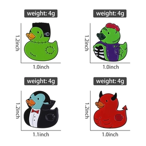 Detailed size view of spooky Halloween cartoon duck enamel pins showing 1.2 inch height