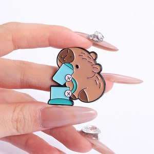 Inspirational cartoon capybara enamel pin using a microscope for science enthusiasts