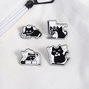 Set of 4 cute black cat enamel pins in manga style on white canvas background