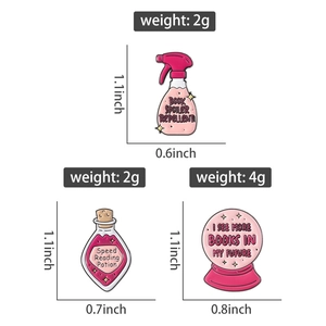 Detailed size and weight chart for pink enamel pins featuring magical bookish designs